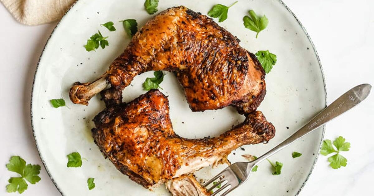 Air Fryer Chicken Marinades Garlic, Herb & Mustard Marinated Air Fryer Chicken on a White Plate