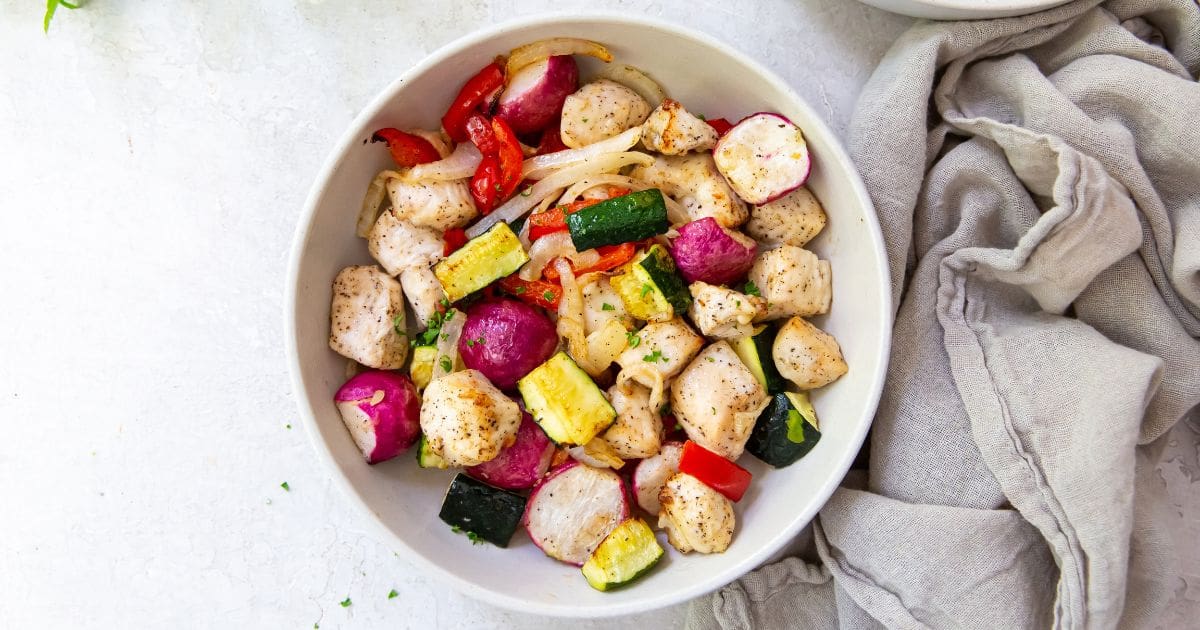 Air Fryer Chicken and Veggies White Bowl Filled with Diced Chicken and Veggies
