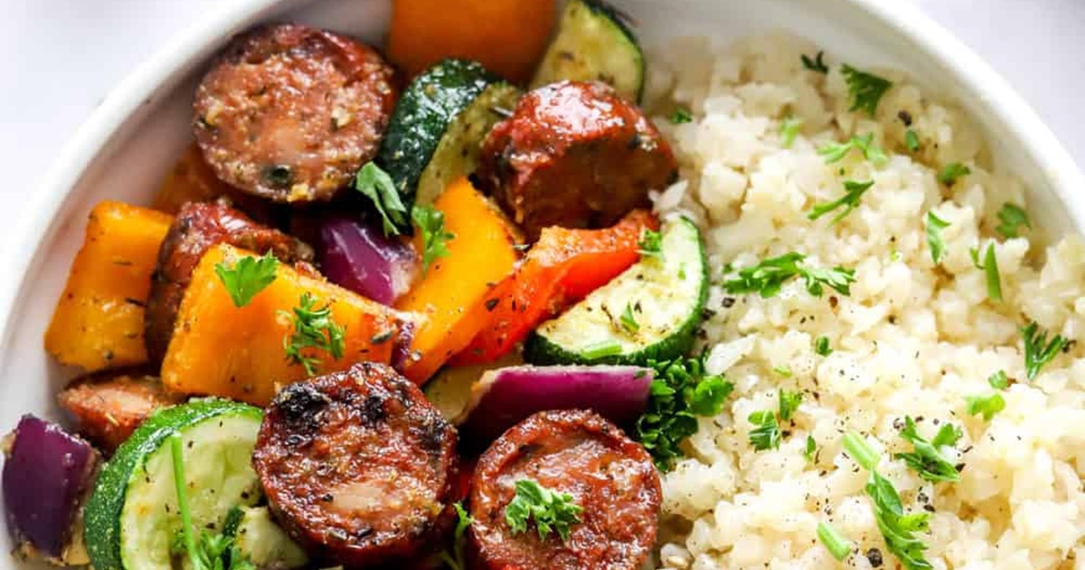 One-Pan Air Fryer Chicken and Veggie Recipes Air Fryer Chicken Sausage and Veggies in a Bowl with Cauliflower Rice