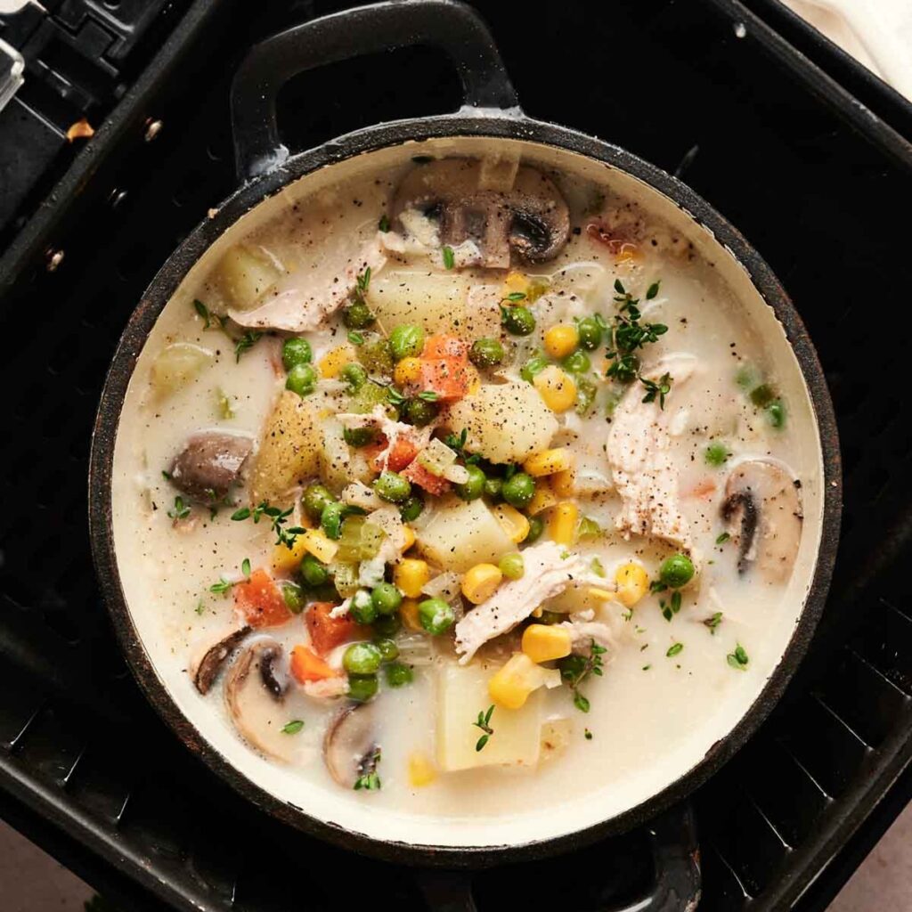 Air Fryer Chicken Soup A Pot of Chicken Soup in an Air Fryer Basket