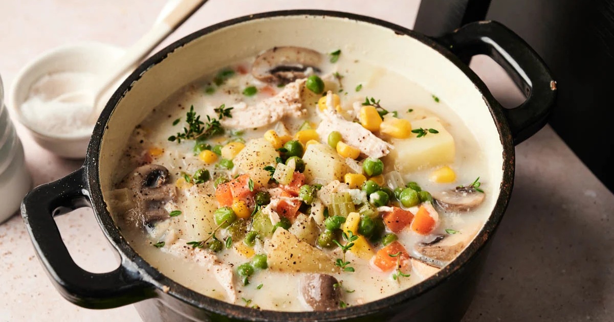 Air Fryer Chicken Soup Air Fryer Chicken Pot Pie Soup in a Black Pot 