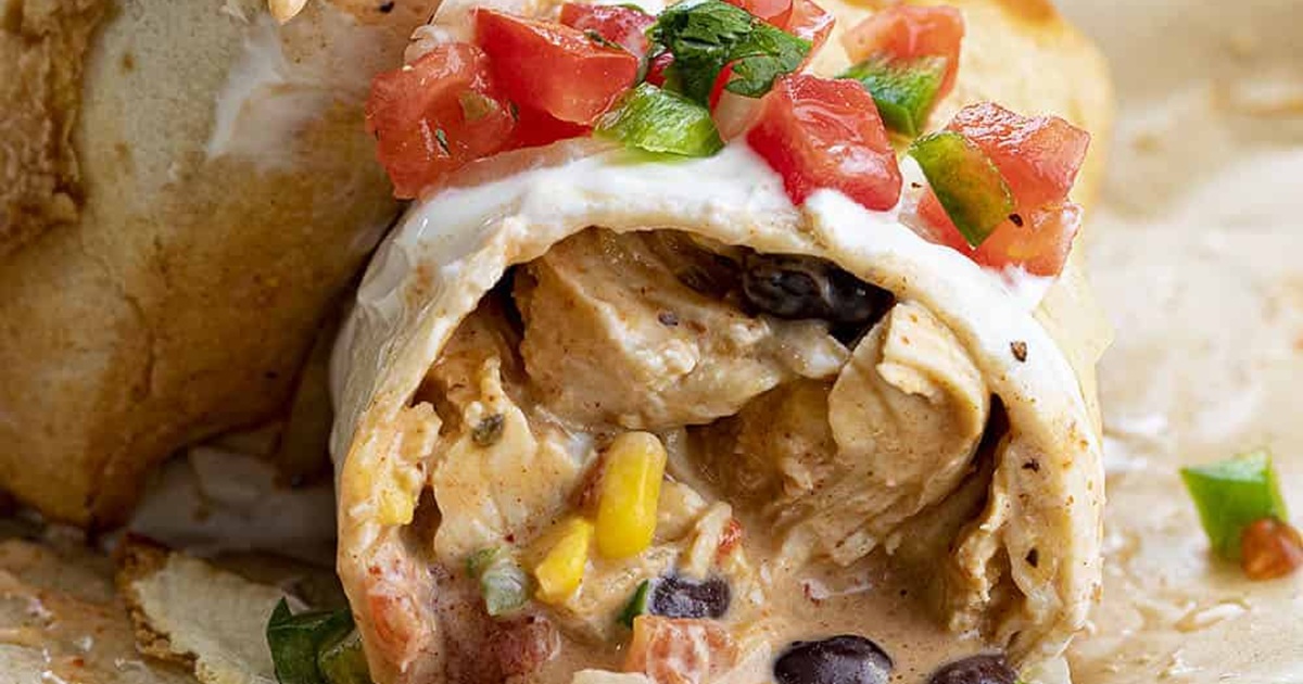 Air Fryer Chicken Taco Recipes Air Fryer Southwest Chicken Burritos Cut Open Showing the Meat, corn, Beans, and Cheese