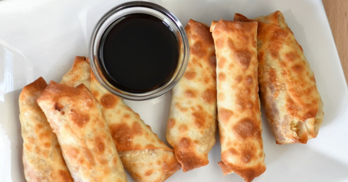 Easy WW-Friendly Air Fryer Chicken Dinners Air Fryer Chicken Egg Rolls on a Plate with a Small Ramekin of Black Sauce
