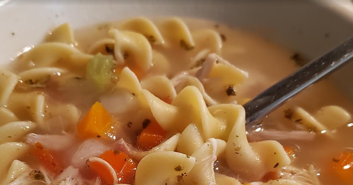 Air Fryer Chicken Soup Close Up of Air Fried Whole Chicken Roaster in a Bowl with a Spoon