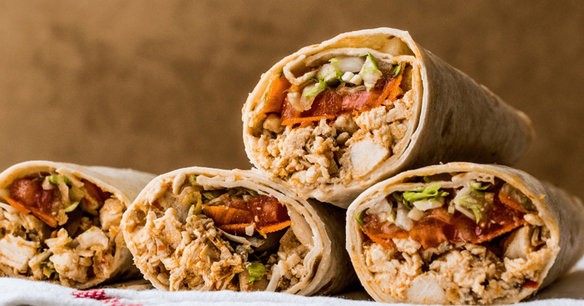 Air Fryer Chicken Taco Recipes Four Air Fryer Chicken Fajita Burritos Stacked on a Plate