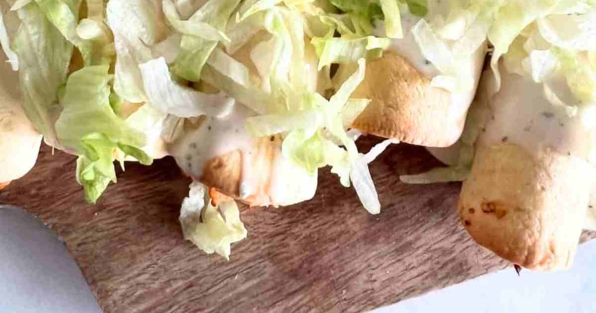 Weight Watchers Air Fryer Chicken Recipes Air Fryer Buffalo Chicken Taquitos on a Wooden Plate Topped with Shredded Lettuce
