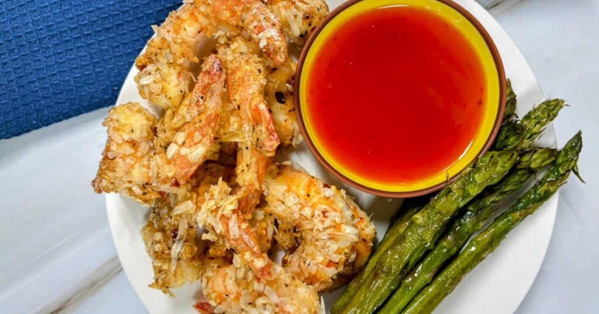 WW Air Fryer Recipes Air Fryer Coconut Shrimp on a Plate with a Small Bowl of Dipping Sauce