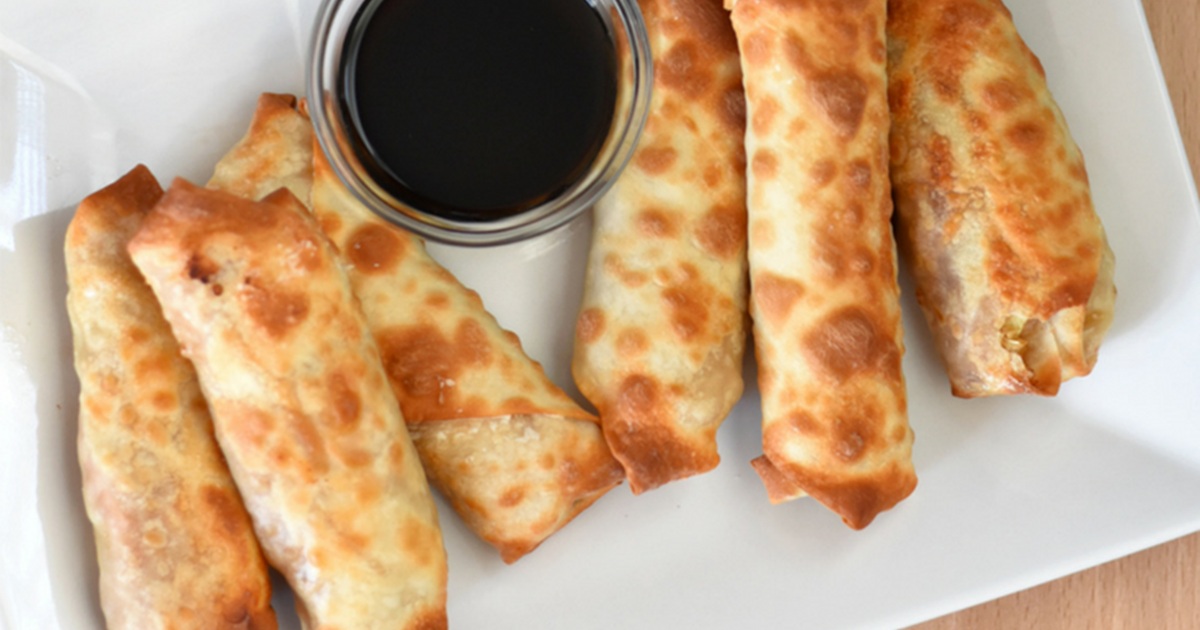 WW Air Fryer Recipes Air Fryer Chicken Egg Rolls on a Plate with a Small Ramekin of Dipping Sauce
