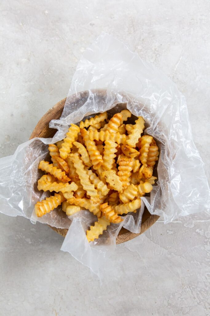 Air Fryer Crinkle Cut French Fries French fries in a bowl.