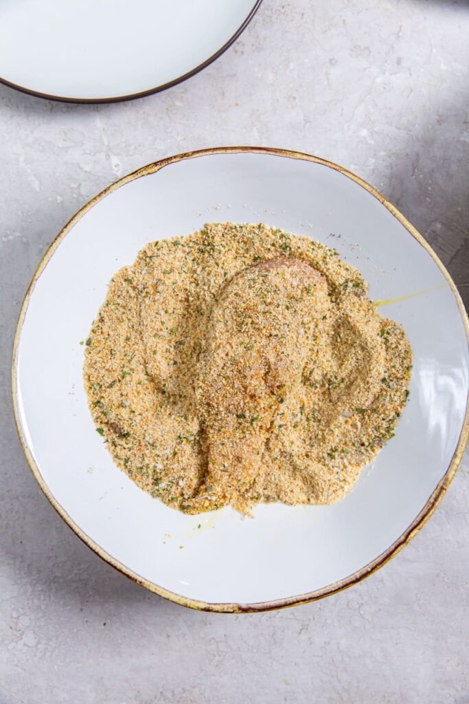 Easy Air Fryer Honey BBQ Chicken Tenders chicken in bread crumbs