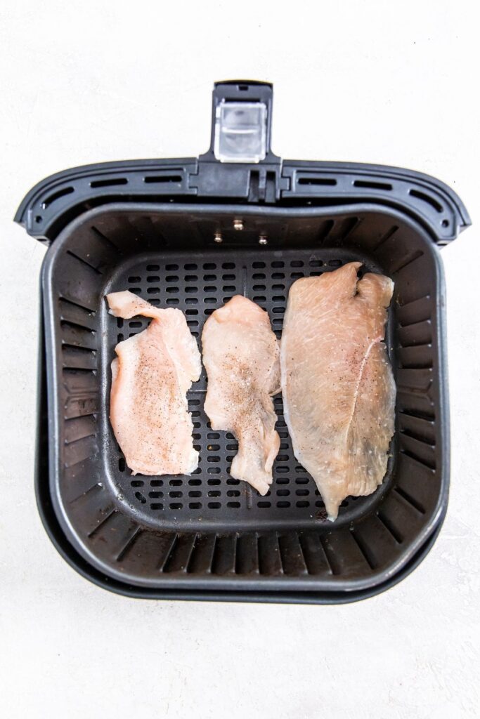 Air Fryer Thin Sliced Chicken Breast chicken breast cooked in an air fryer.