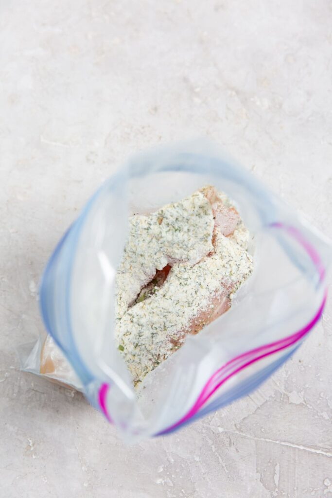 Air Fryer Ranch Chicken Tenders ziplock bag with chicken and ranch inside