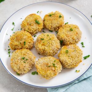 Homemade Air Fryer Chicken Nuggets Recipe nuggets on a Plate Sprinkled with Parsley
