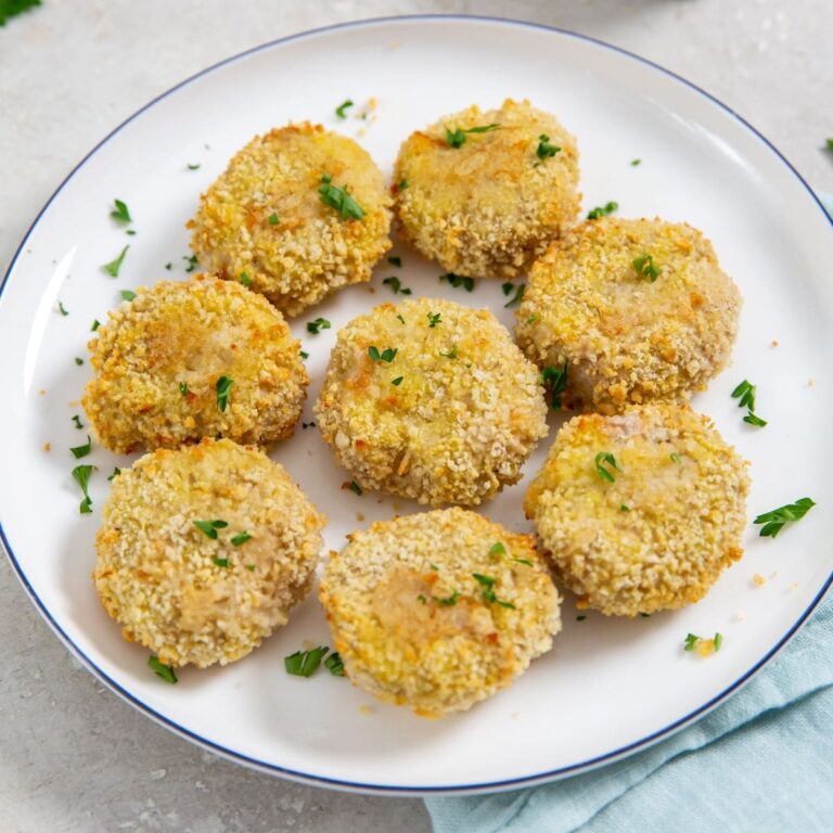 Homemade Air Fryer Chicken Nuggets Recipe nuggets on a Plate Sprinkled with Parsley